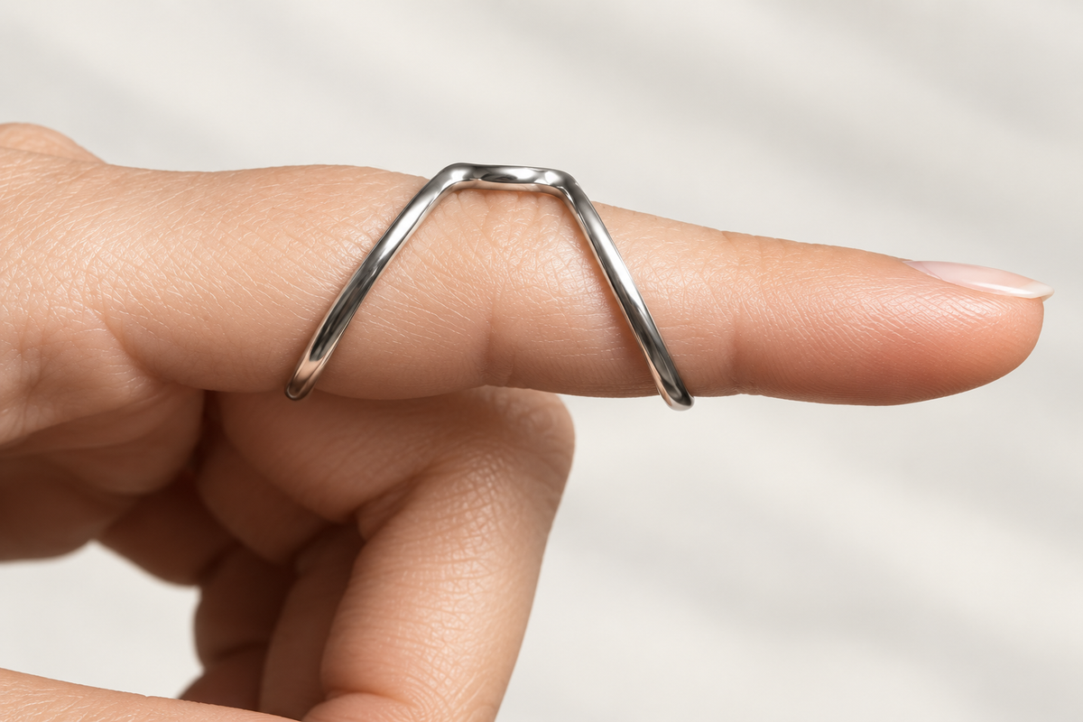 Boutonniere finger splint worn on a finger, profile view of the two-band shape
