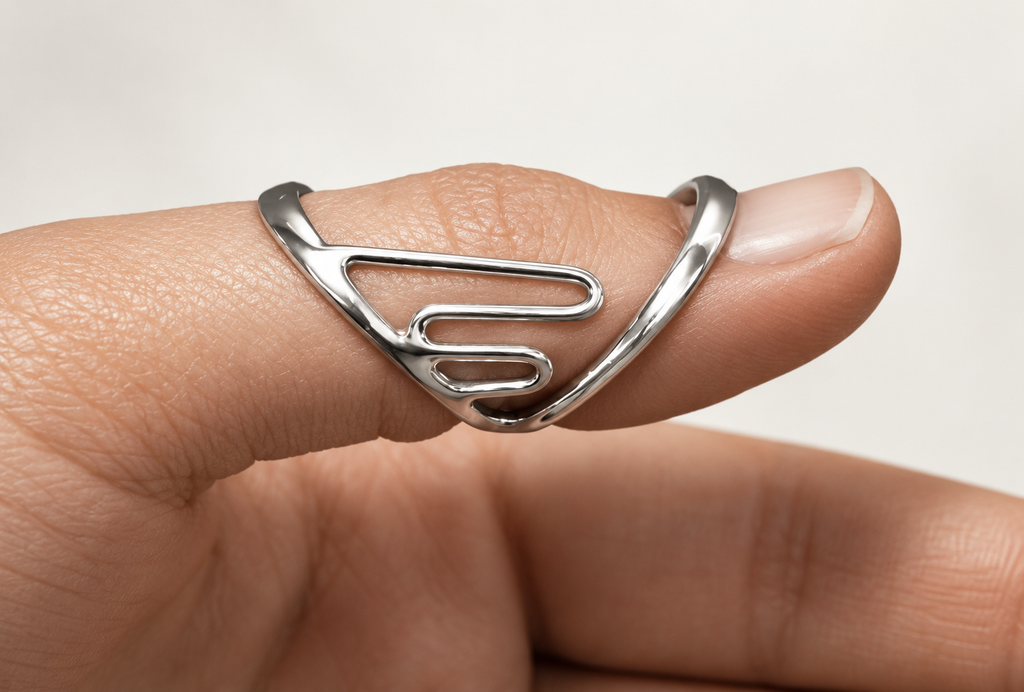 Lateral support finger splint worn on a finger, close-up of the open frame