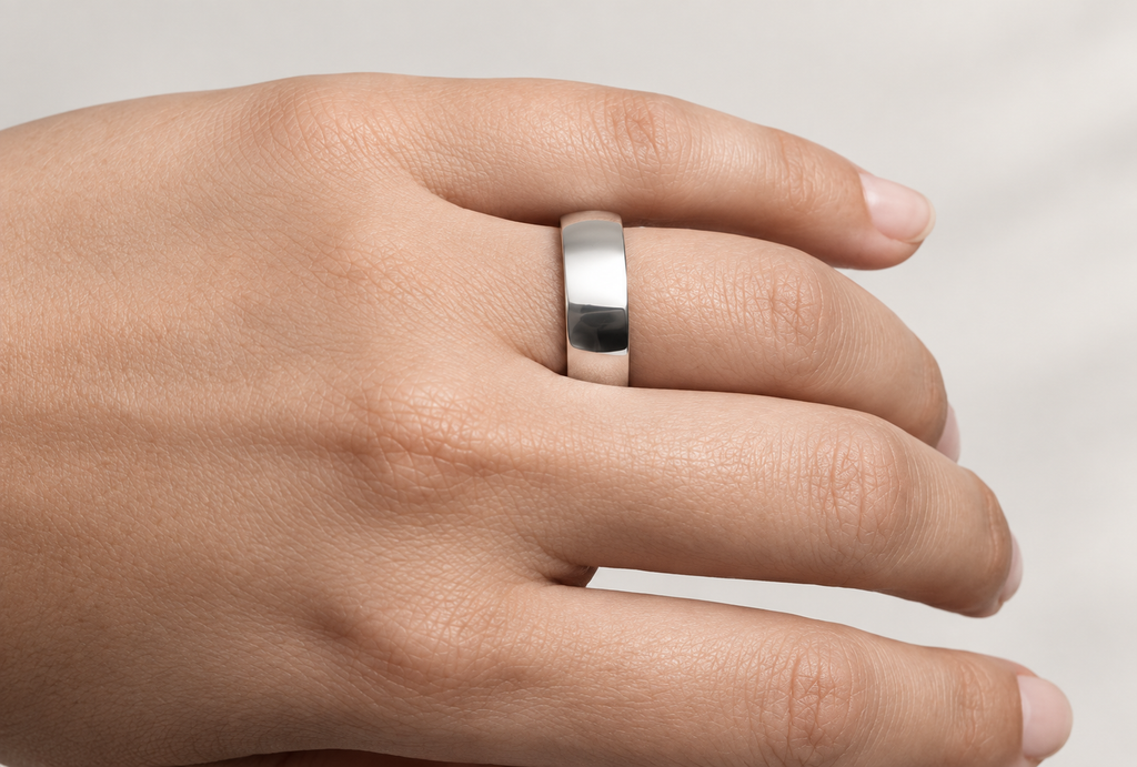 Pulley ring worn on a finger, back of hand view