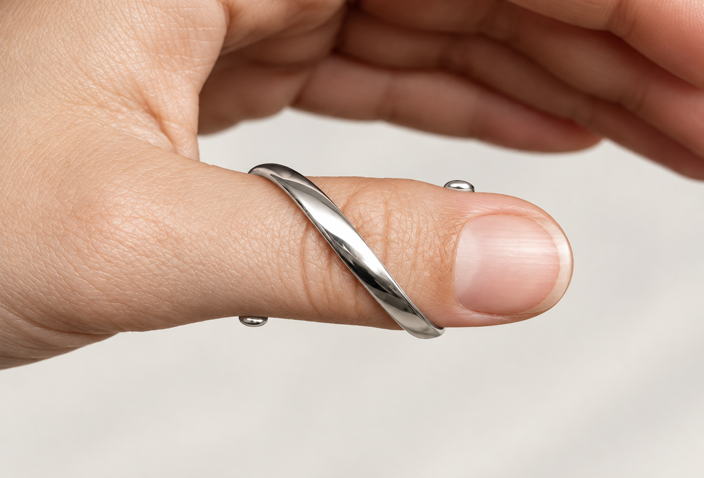 Spiral splint worn on the thumb, close-up of the spiral band
