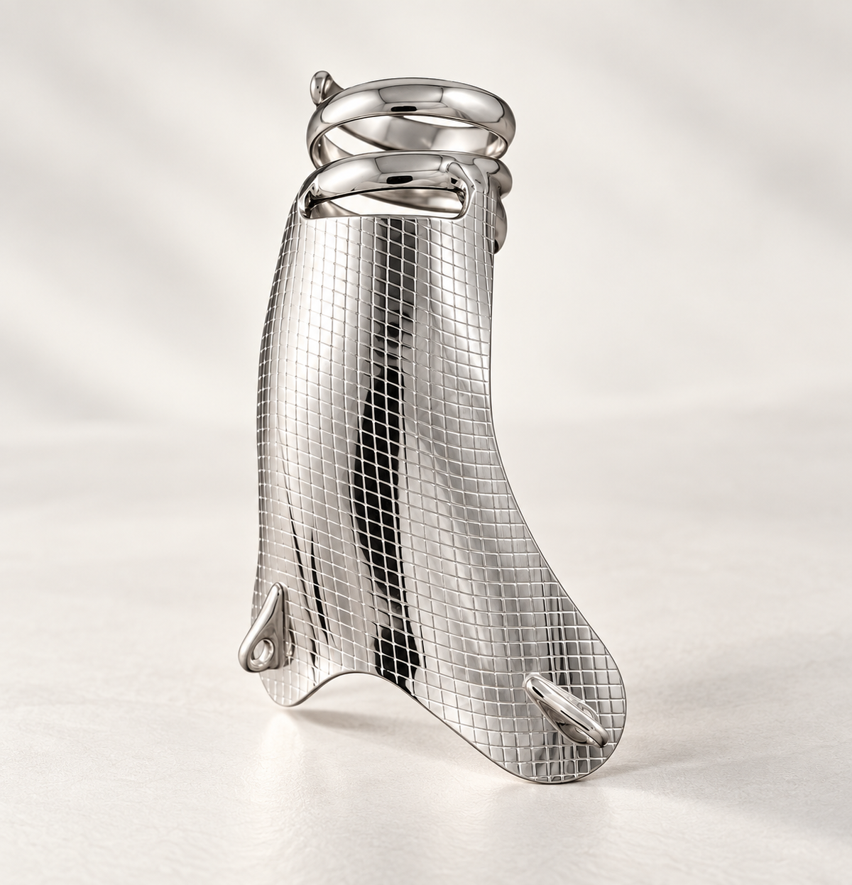 Stable thumb splint front view showing the textured plate and stacked thumb rings