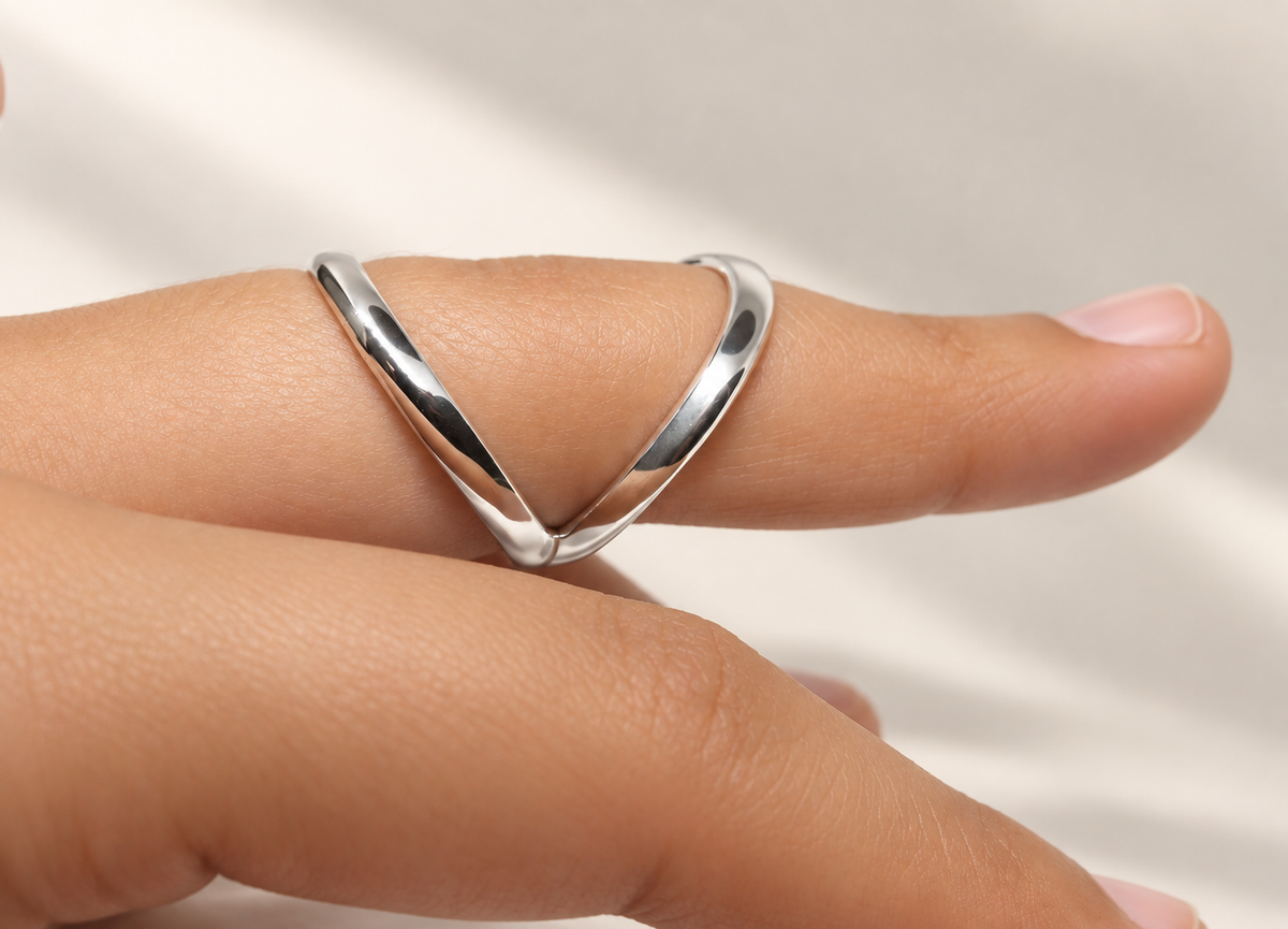 Swan neck splint worn on an extended finger, side view