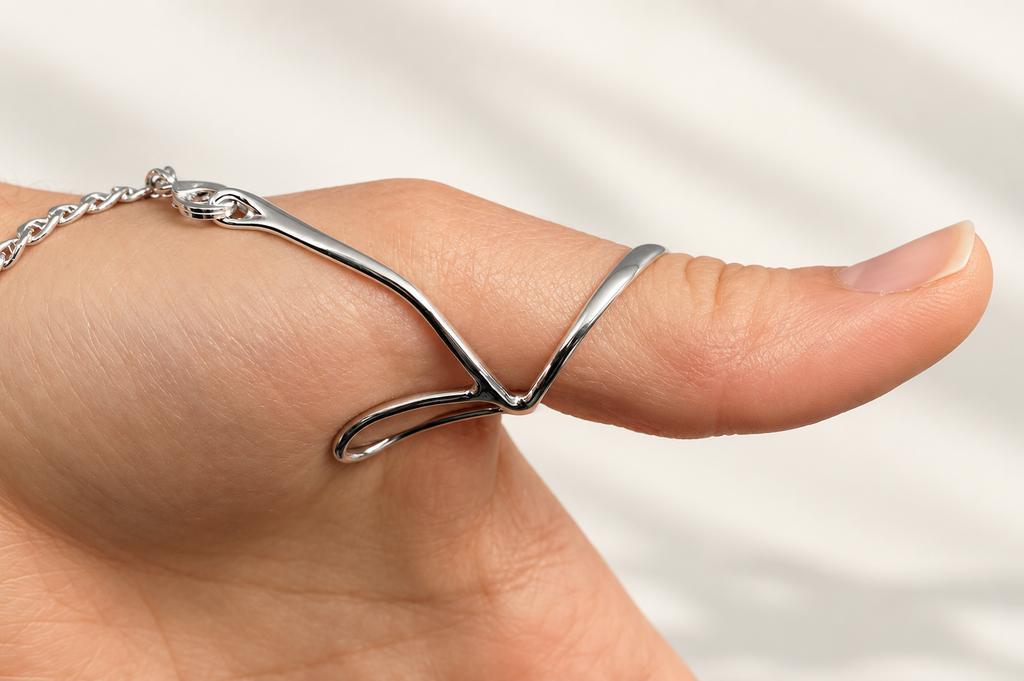 Thumb MCP splint worn on the thumb with a chain bracelet, side view